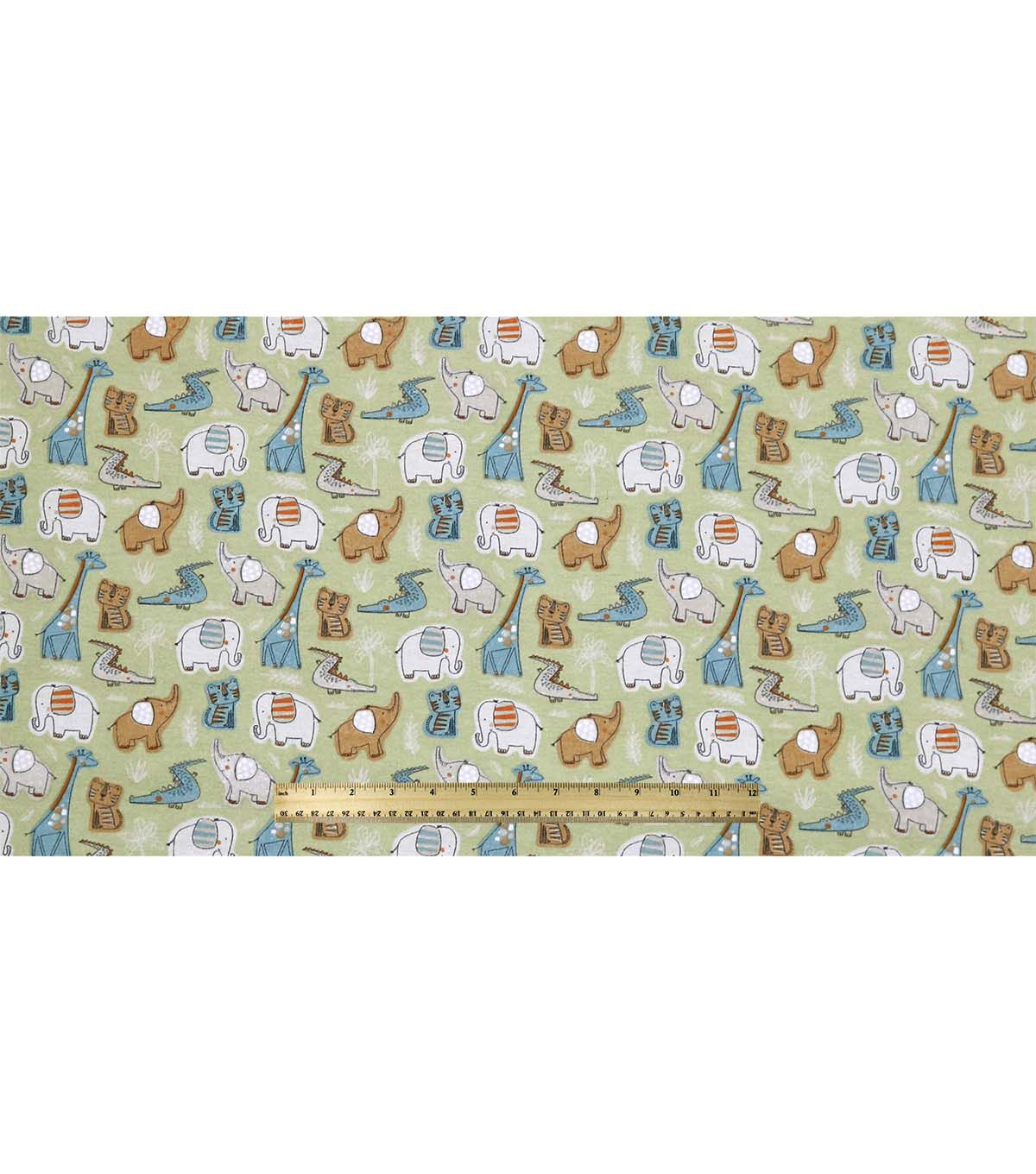Jungle Animals on Green Super Snuggle Flannel Fabric