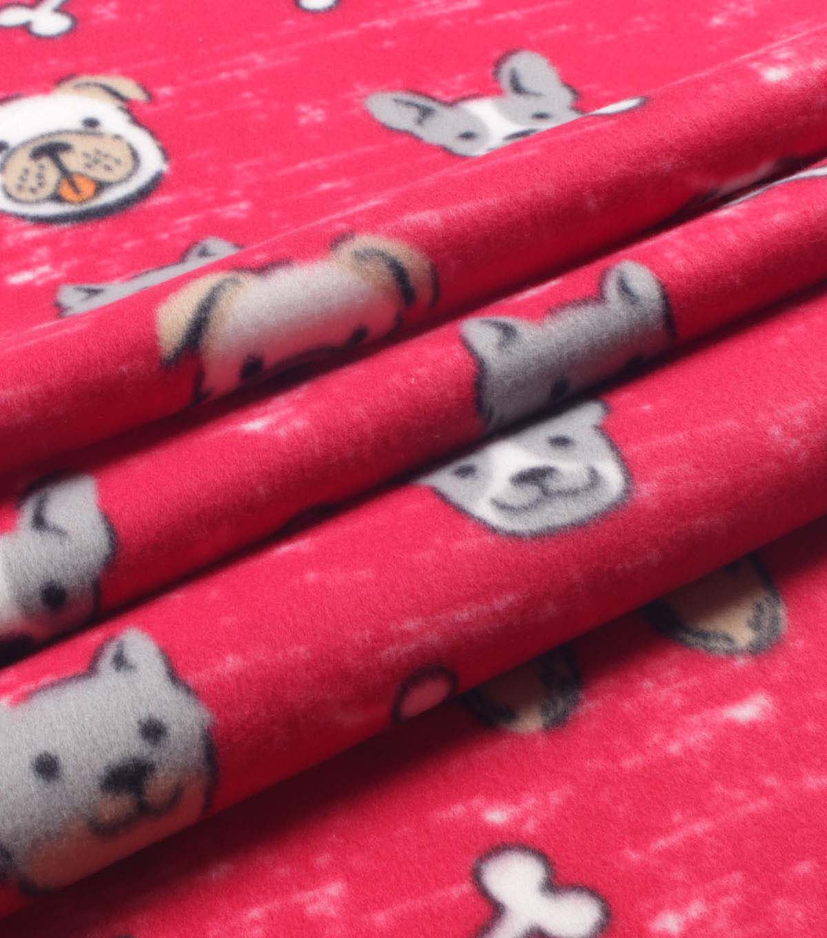 Dog Faces With Bones on Red Blizzard Fleece Fabric