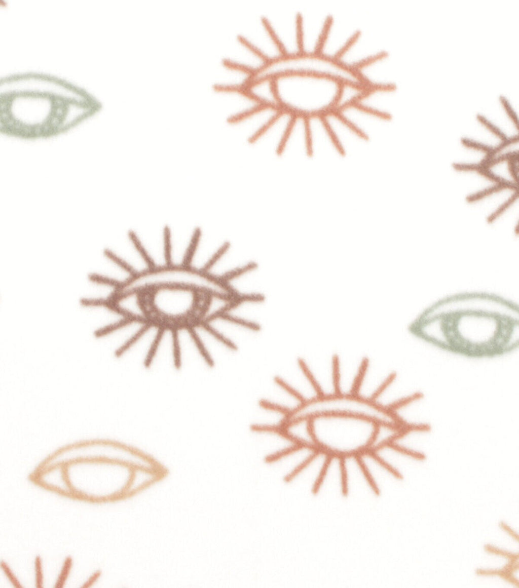 Cream Eye Blizzard Prints Fleece Fabric