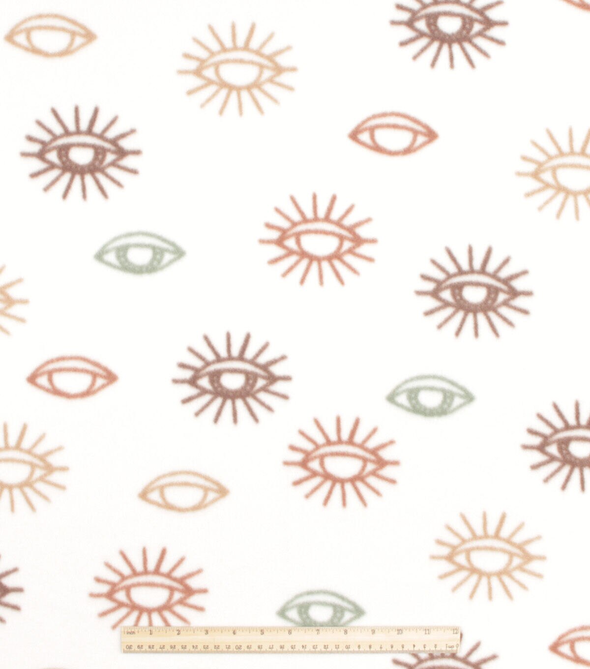Cream Eye Blizzard Prints Fleece Fabric