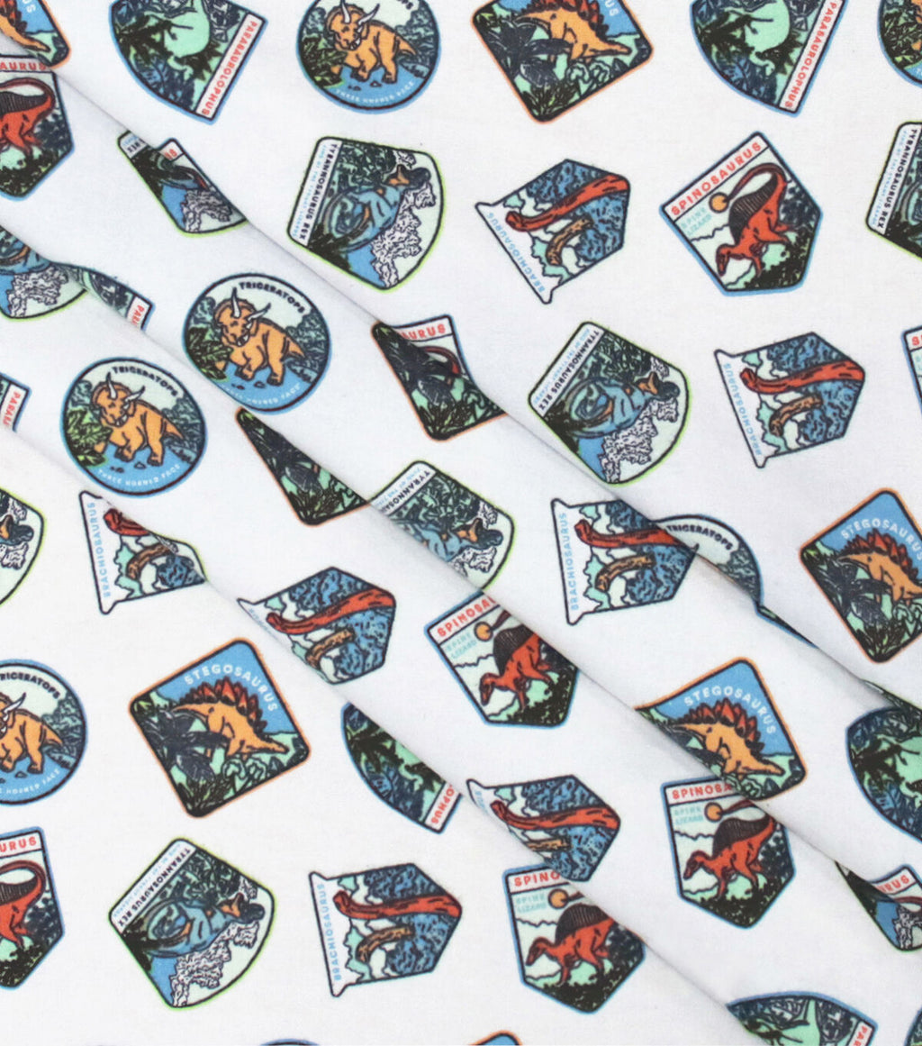 Dino Badges Super Snuggle Flannel Fabric