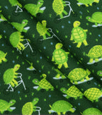 Green Playful Turtles Novelty Cotton Fabric