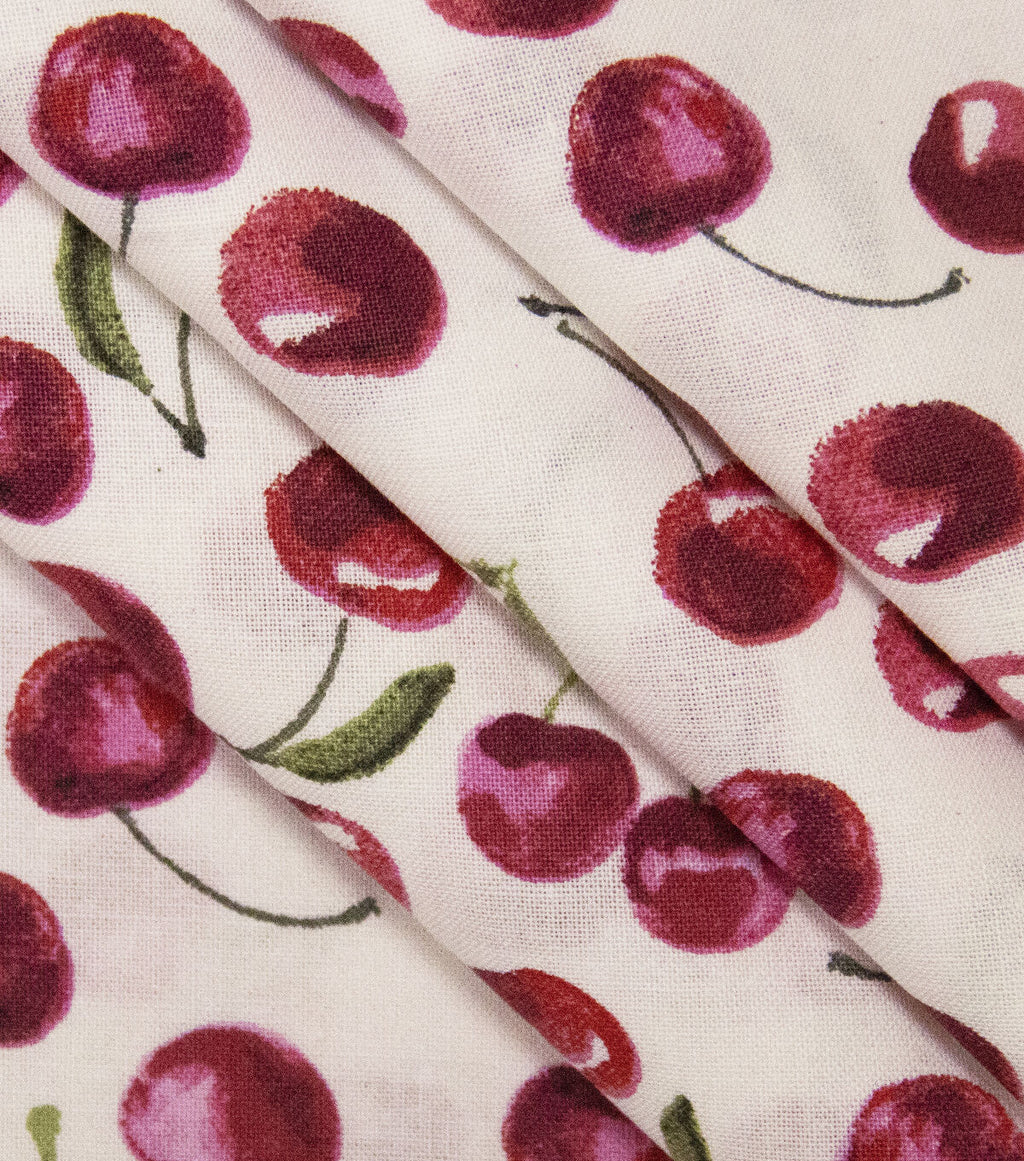 Tossed Cherries Novelty Cotton Fabric