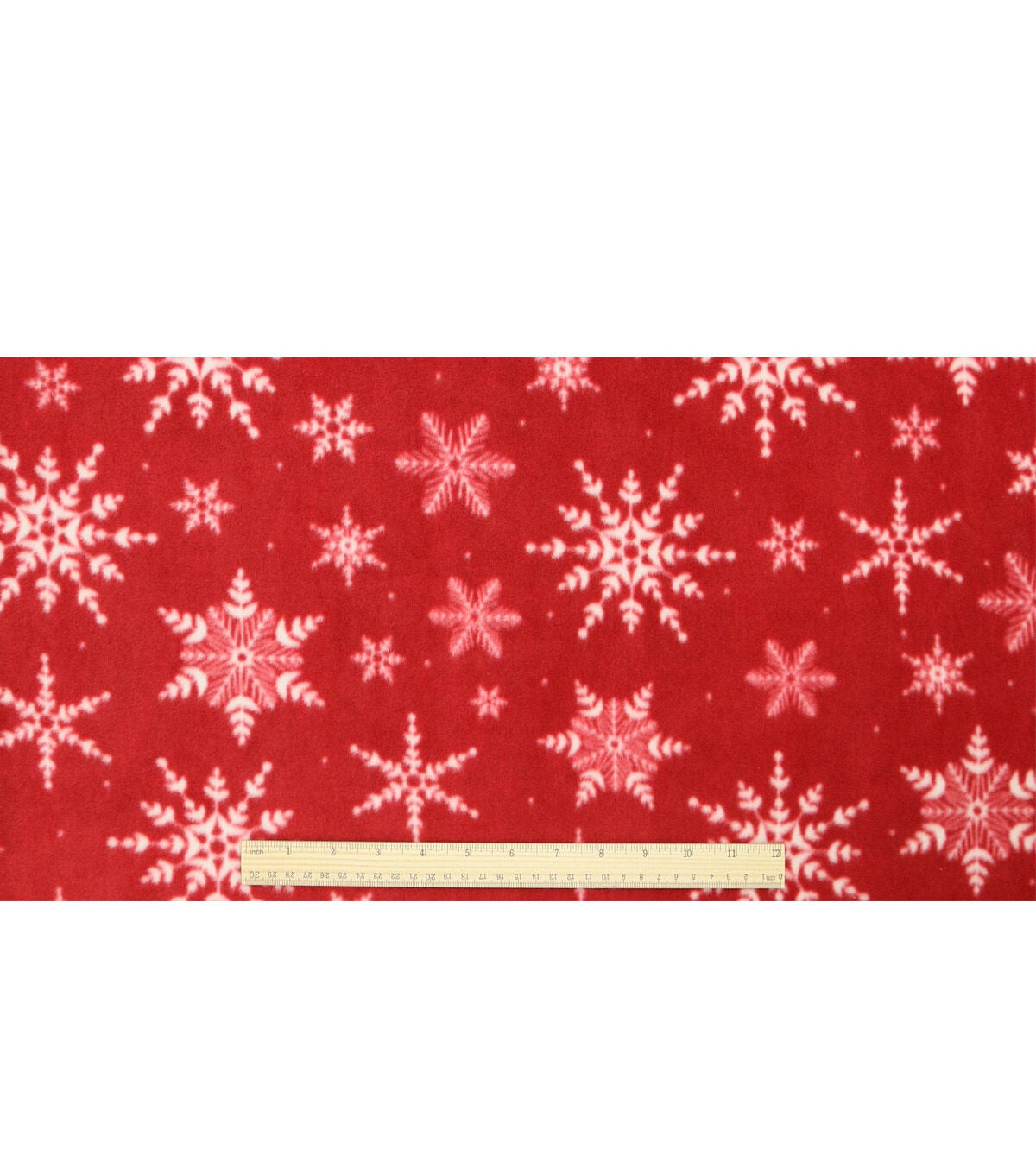 Snowflakes on Red Anti Pill Fleece Fabric