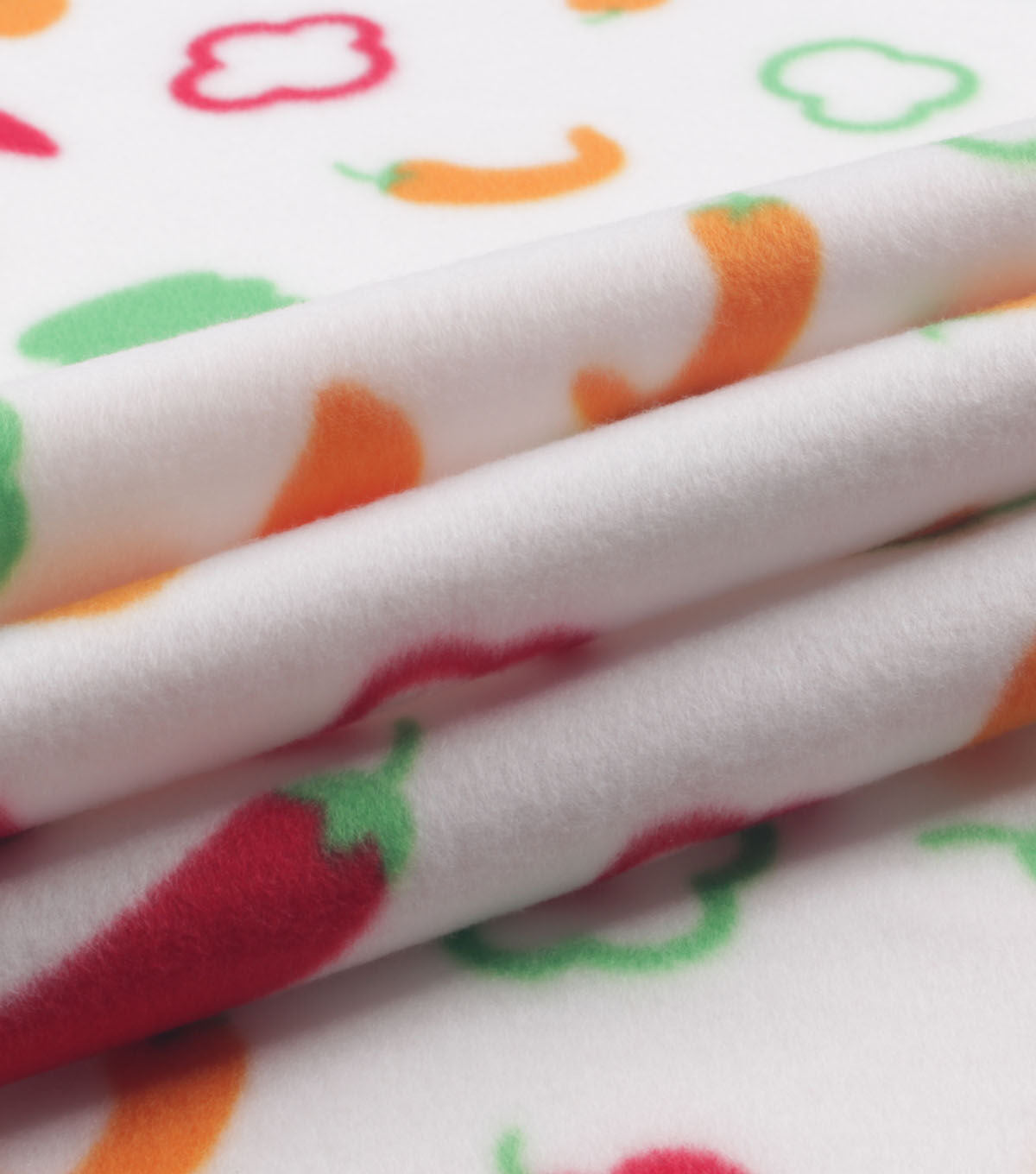 Peppers on White Blizzard Fleece Fabric