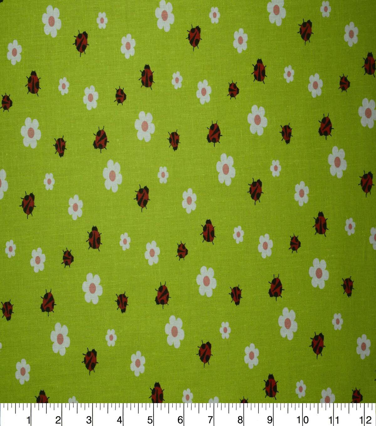 Ladybugs & Daisies on Green Cotton Fabric by Quilter's Showcase