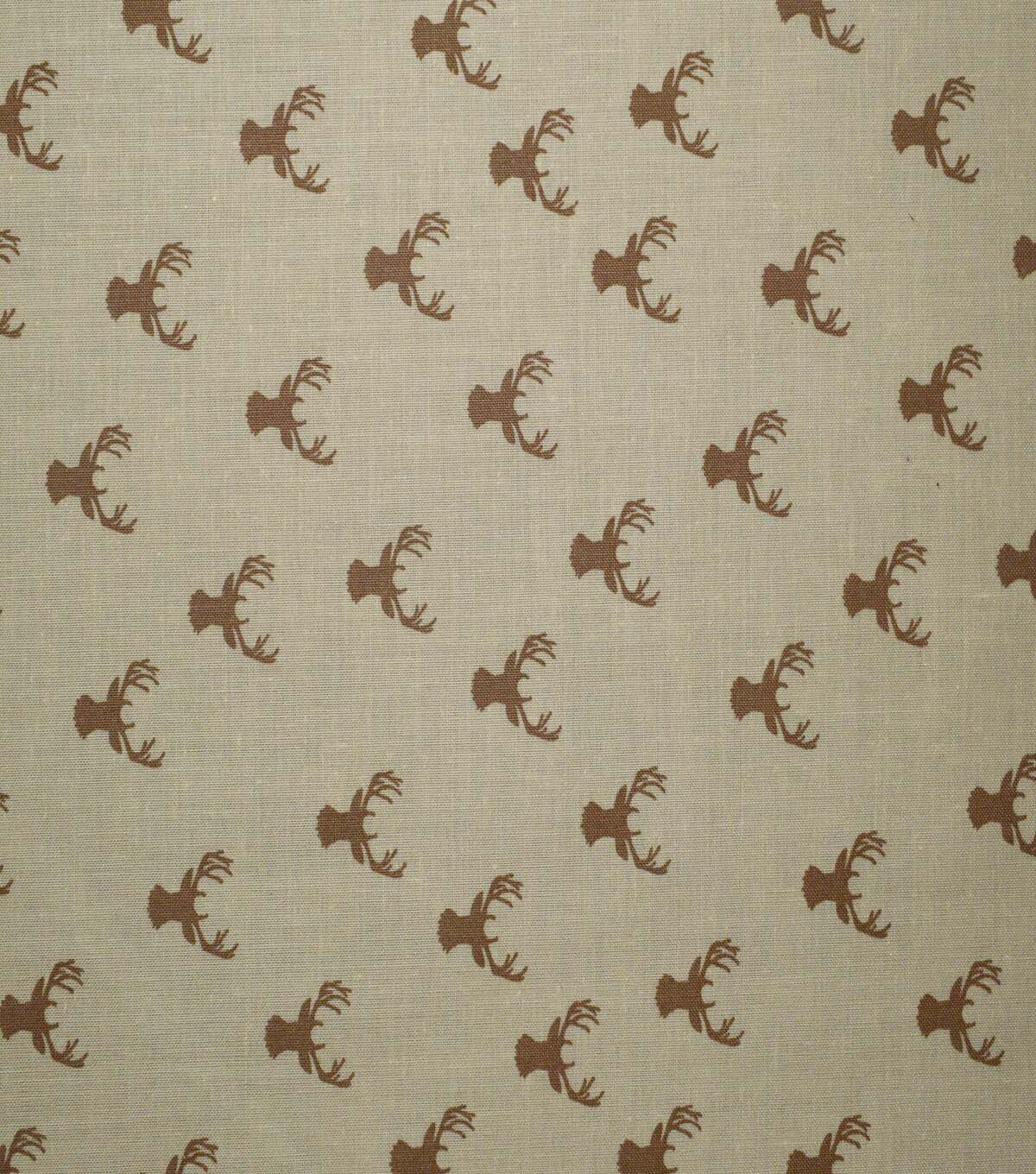 In the Wild Stag Heads on Brown Cotton Fabric by Quilter's Showcase