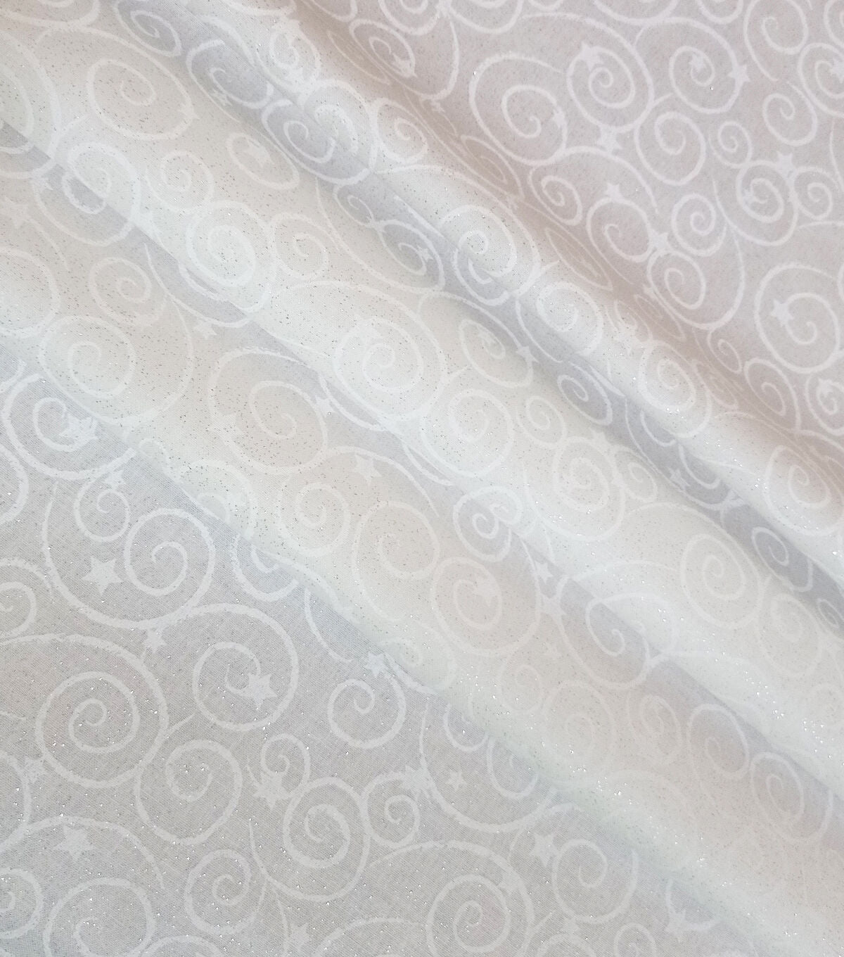 Stars on Swirls White Glitter Cotton Fabric by Keepsake Calico