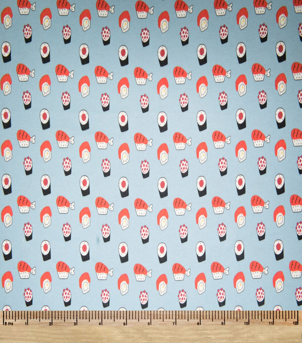Super Snuggle Tossed Sushi Flannel Fabric