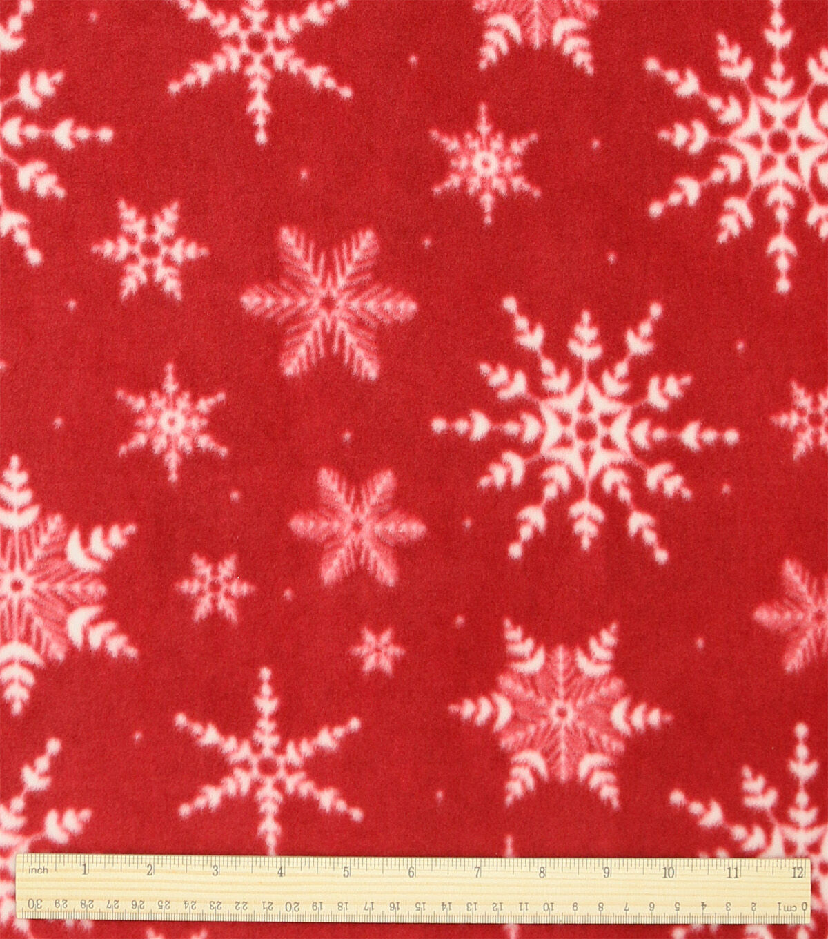 Snowflakes on Red Anti Pill Fleece Fabric