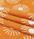 Suns on Mustard Blizzard Fleece Fabric
